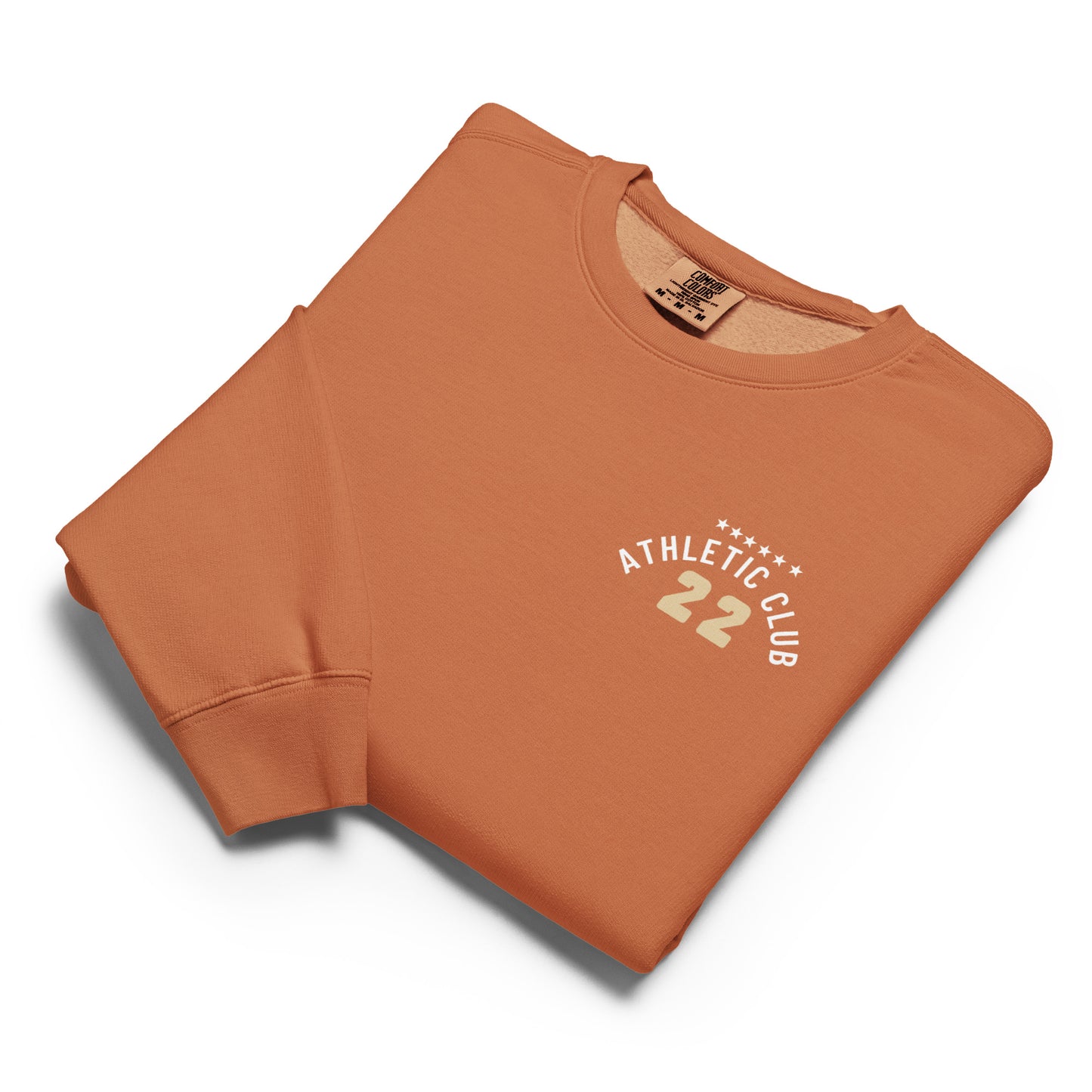 folded view of washed orange fleece casual men's sweatshirt
