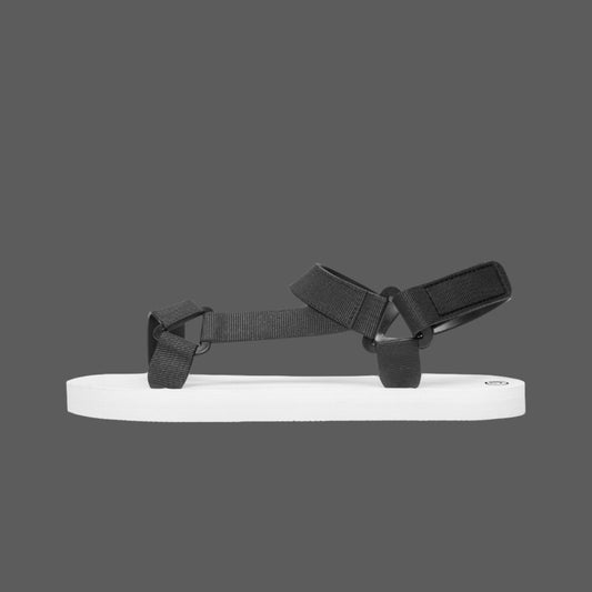 white strappy sandals with black straps