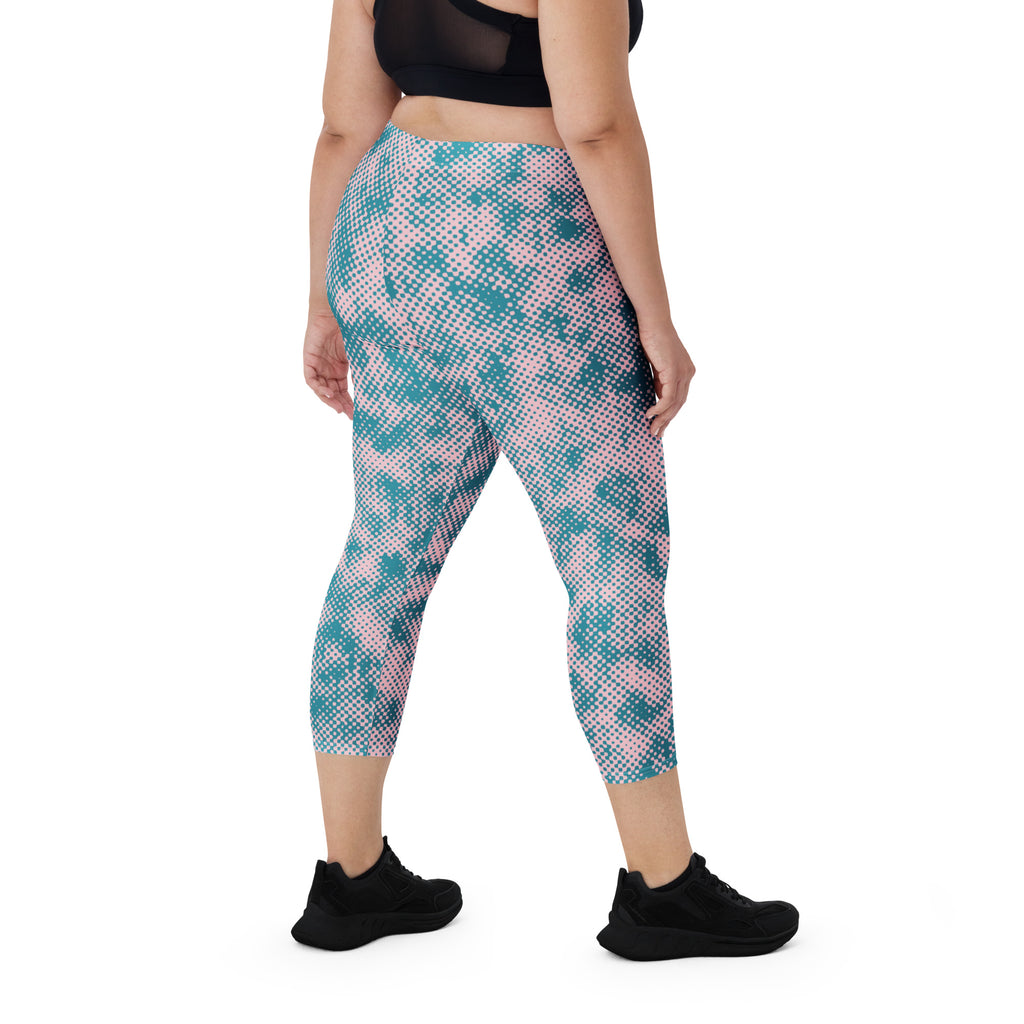Back view of mid-calf capri leggings in blue camo design