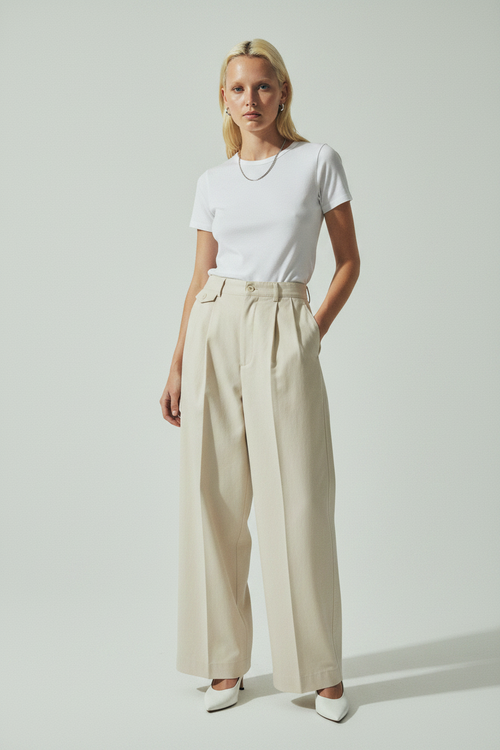 model wearing straight leg trousers with relaxed fit