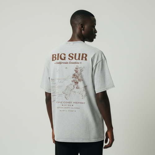 Male model wearing ‘Big Sur California’ vintage coastal graphic oversized tee back print