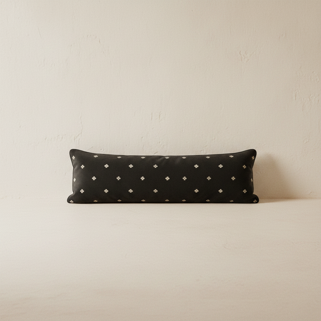 25 in-a-half-inch long black velvet bolster pillow with diamond pattern