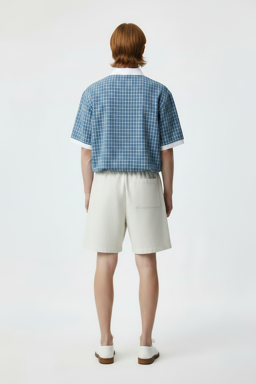 back view of male model in casual plaid polo shirt 