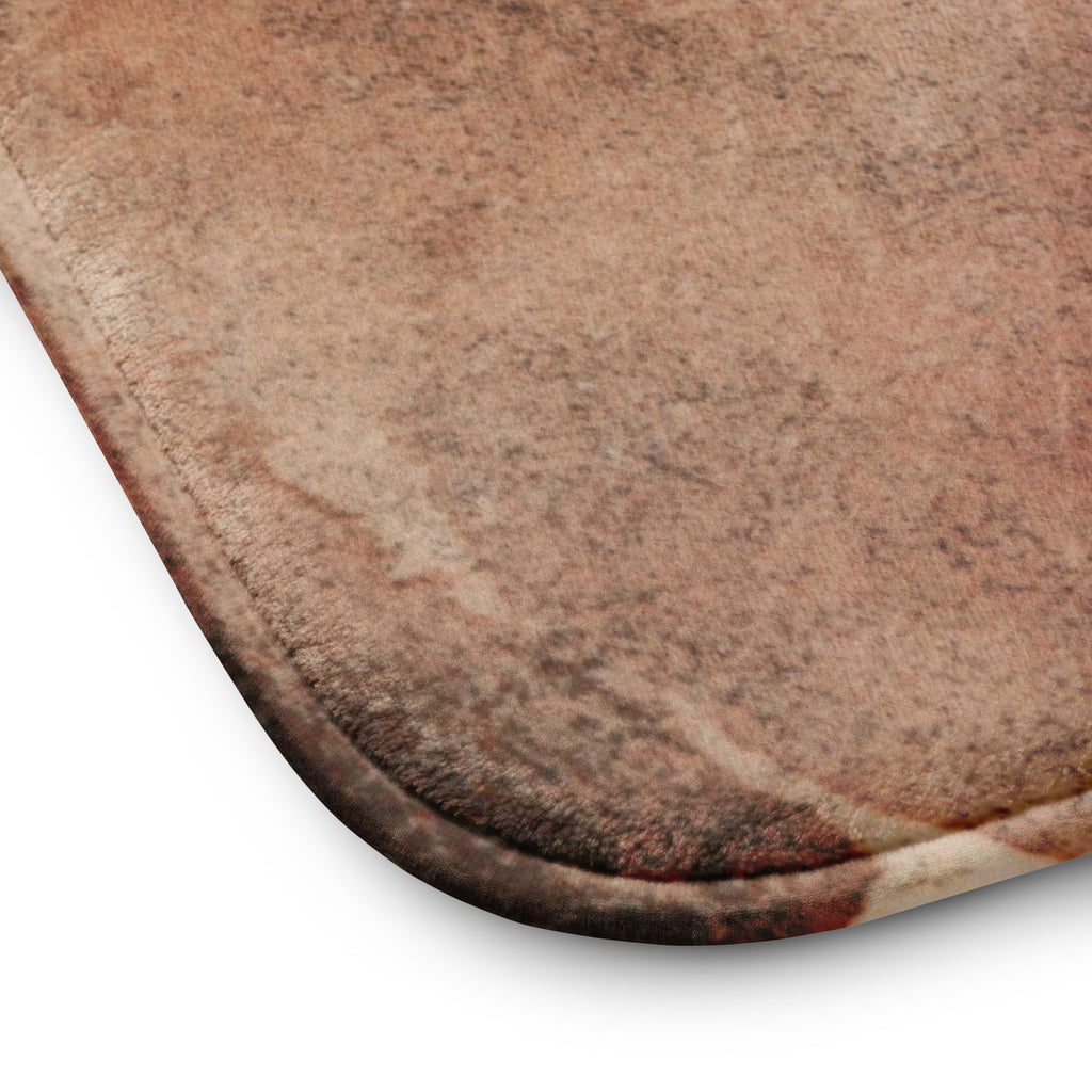 Close-up of earth tone bathroom rug 