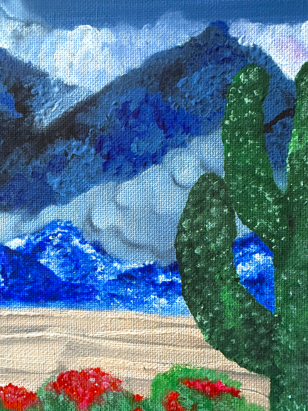 close up detail of acrylic texture in desert landscape painting 