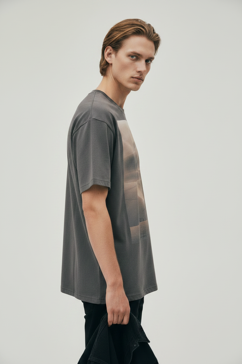 side view of male model wearing artistic horizon streetwear t-shirt