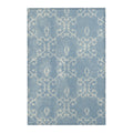 flat lay of vintage distressed dusty blue damask area rug 
