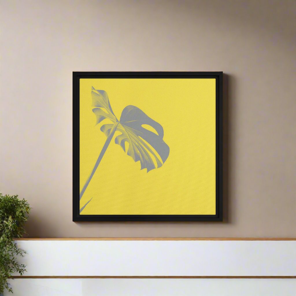 yellow palm leaf canvas print artwork on black floater frame 