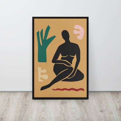 Framed abstract artwork with a black silhouette of a woman, green tree, and pink flower on a gold background.