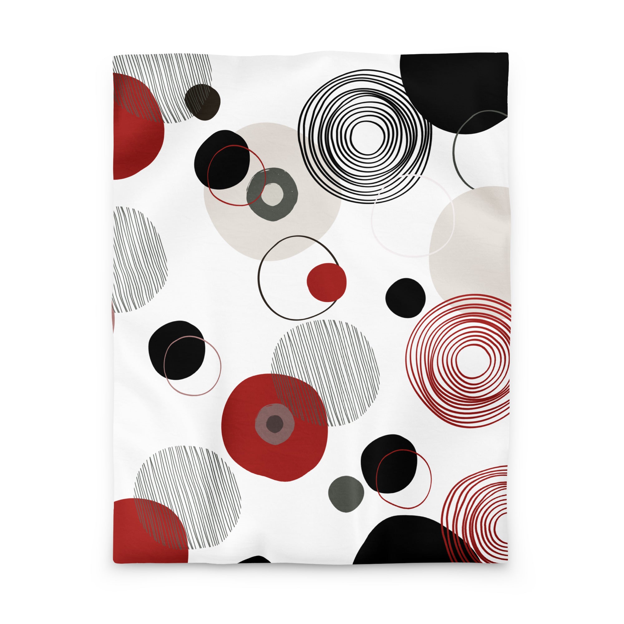flat lay of geometric orbit duvet cover with an abstract circular art print 