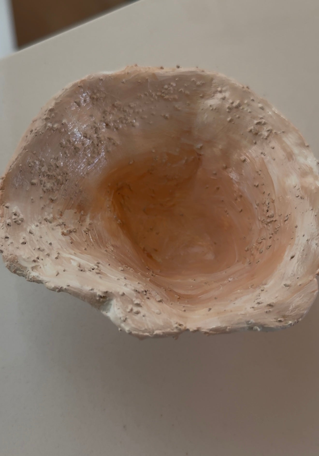 textured interior of handmade ceramic jewelry bowl