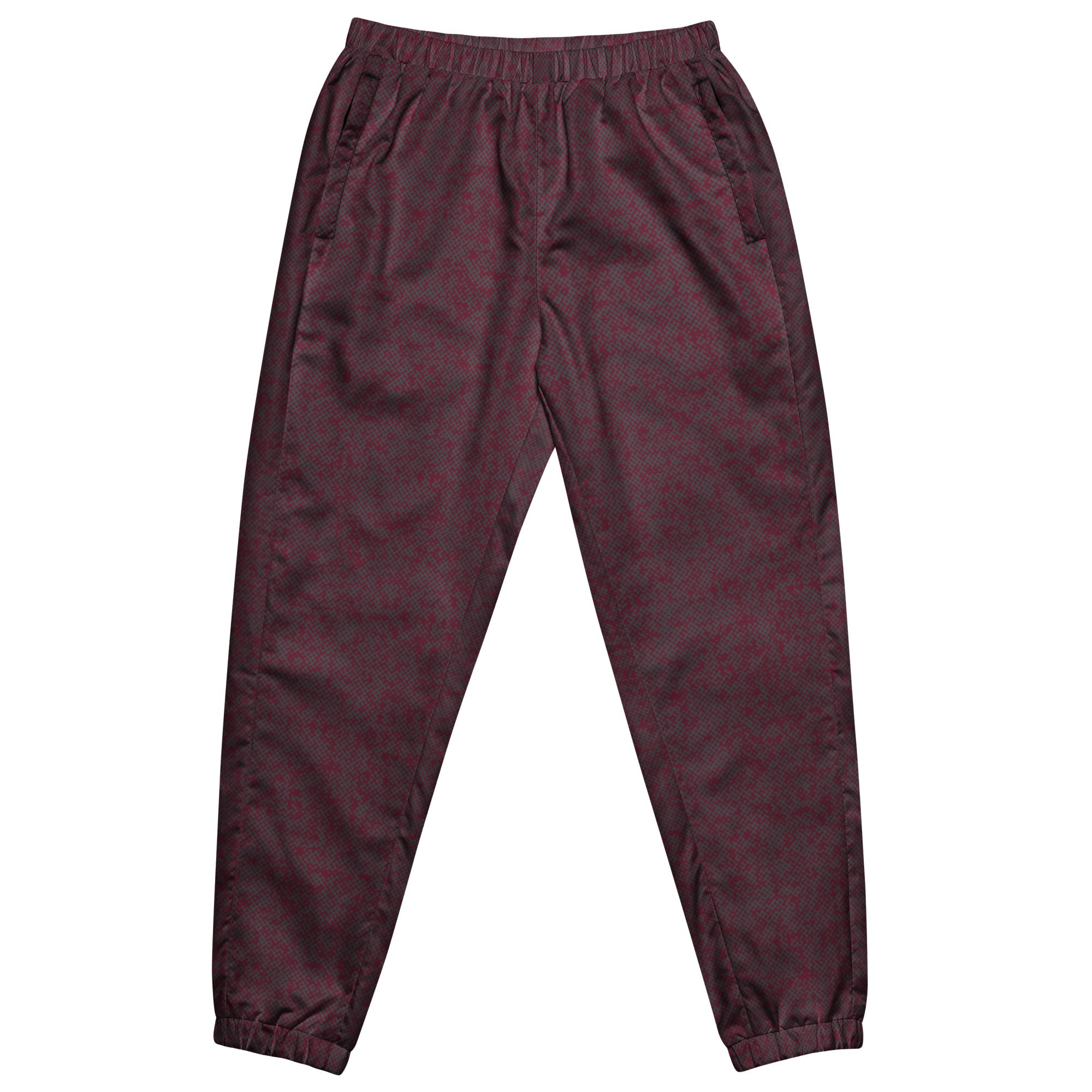 Maroon track pants on a white background
