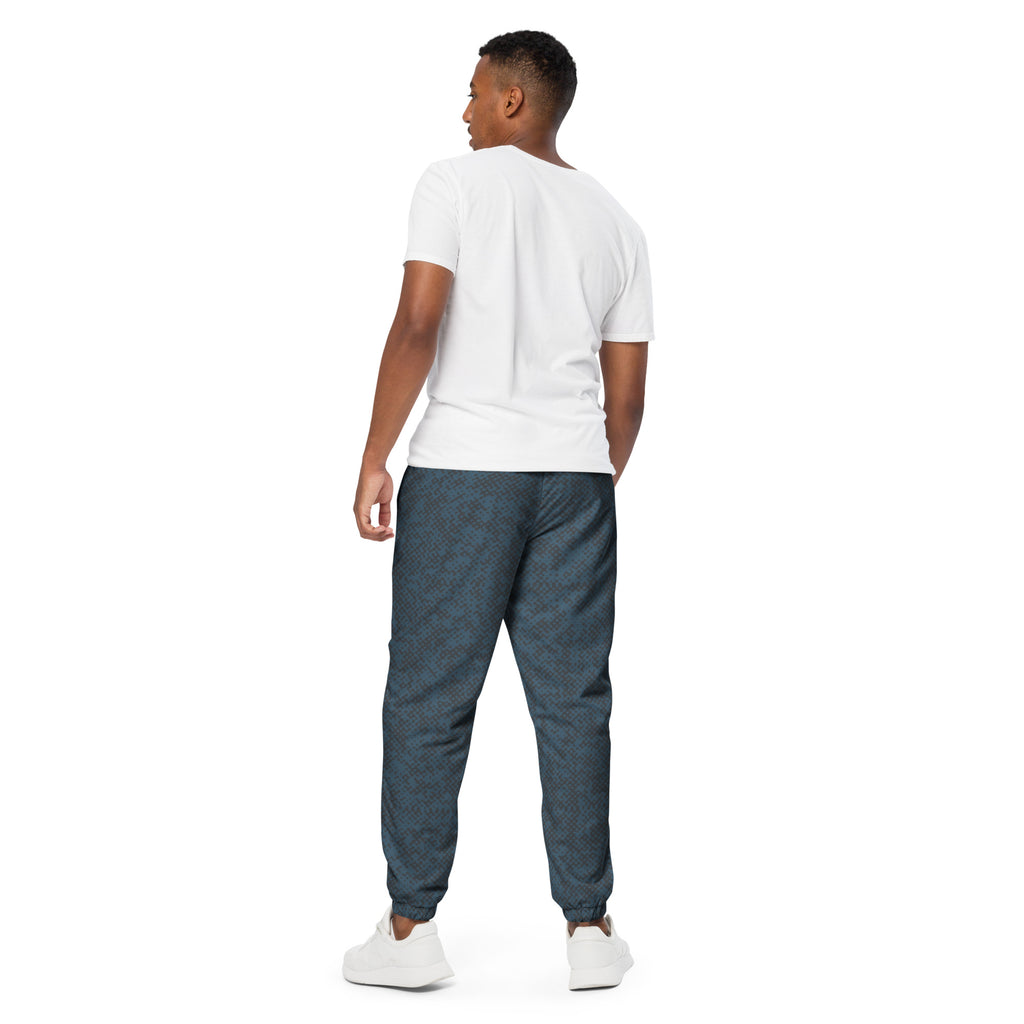 Back view of man wearing a white t-shirt and blue jogger pants on a white background