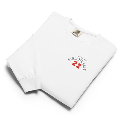 folded view of men's garment-dyed white fleece top