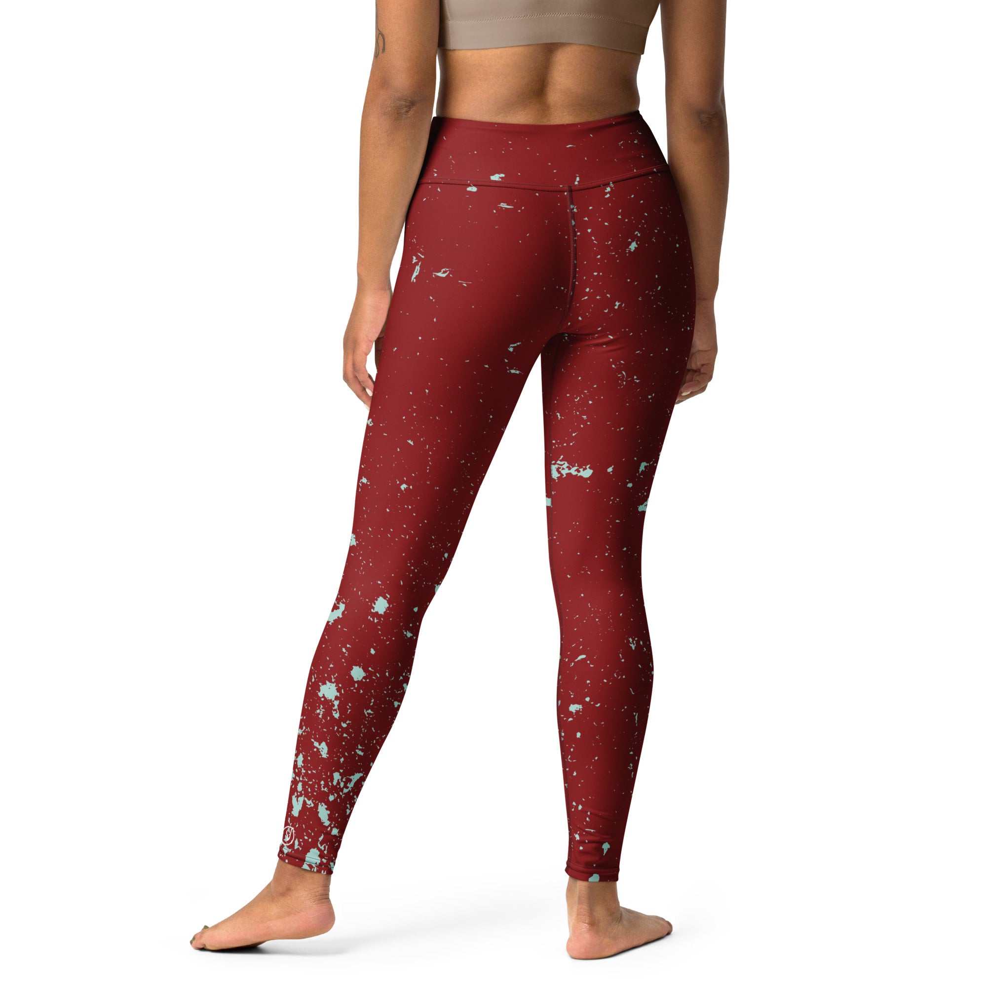 back view of women's paint splatter workout leggings