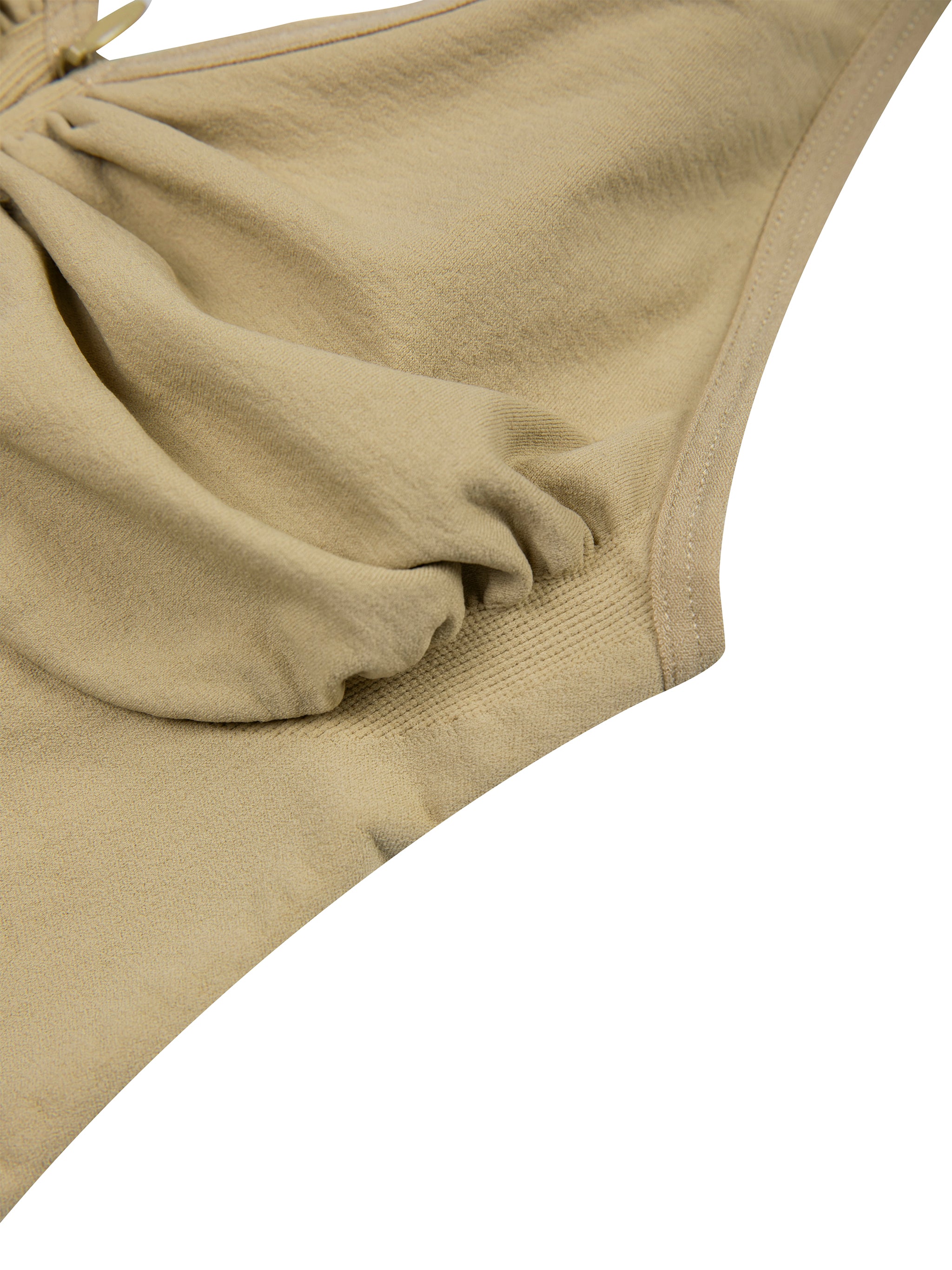 Close-up of a beige bodysuit ruched detail