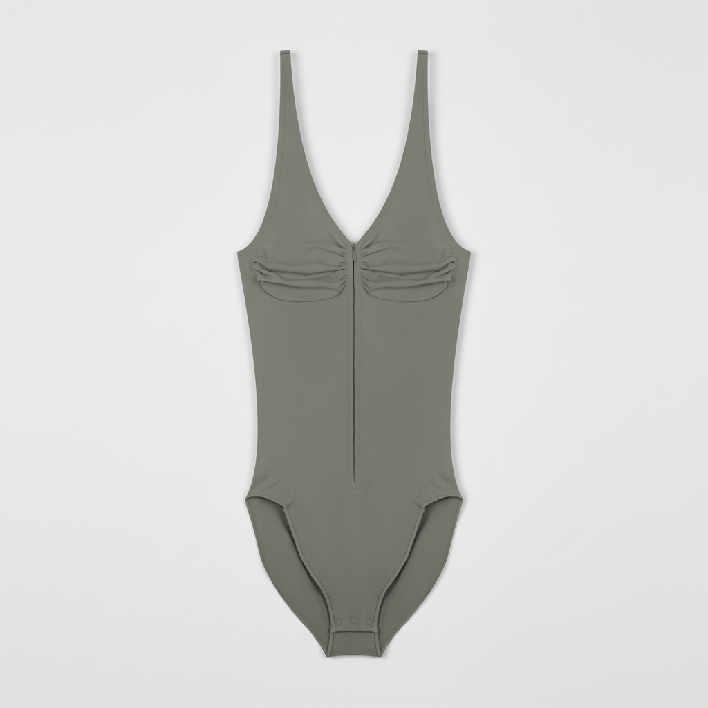 flat lay front view of grey ruched zip sporty bodysuit