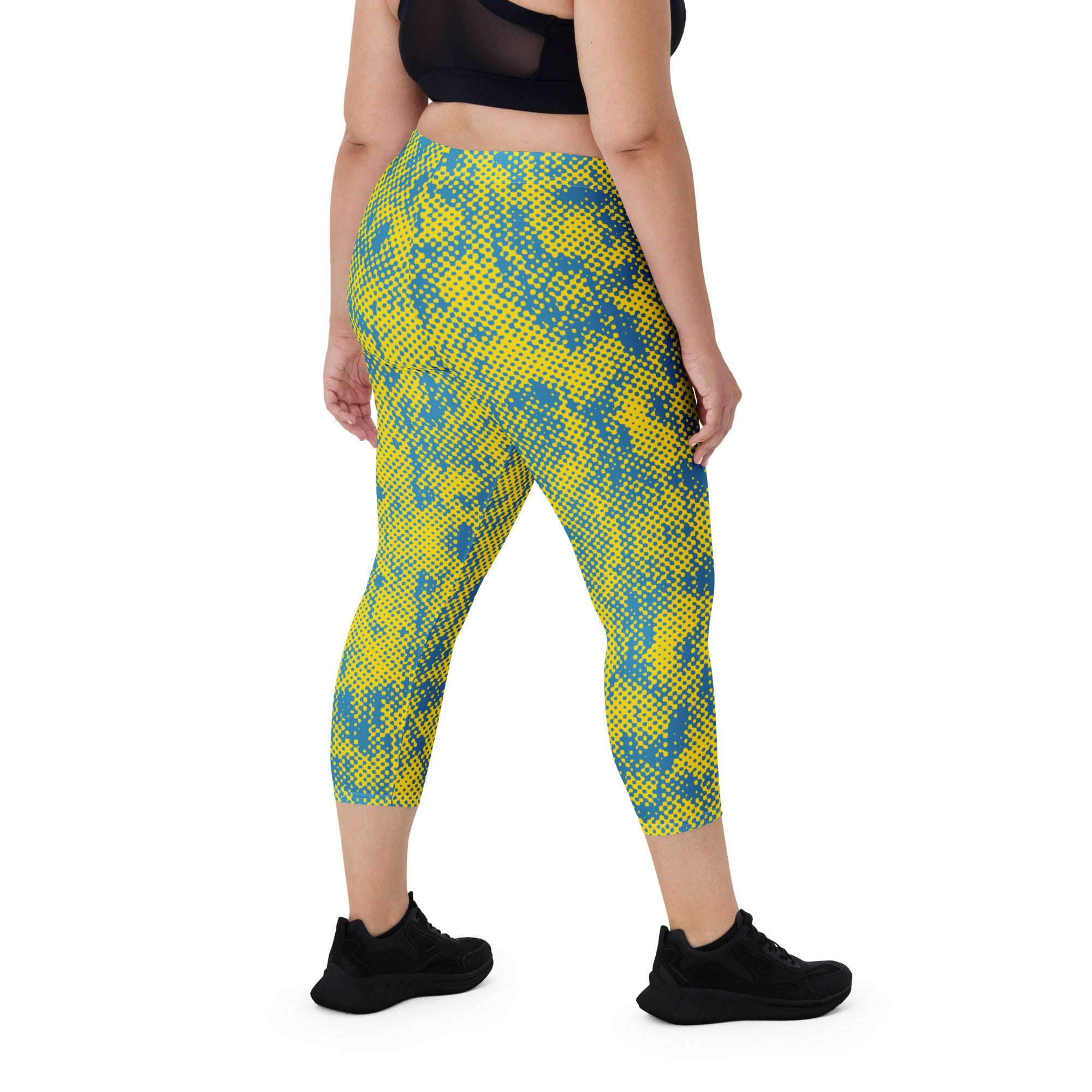 back view of women’s plus size comfortable workout capri leggings 