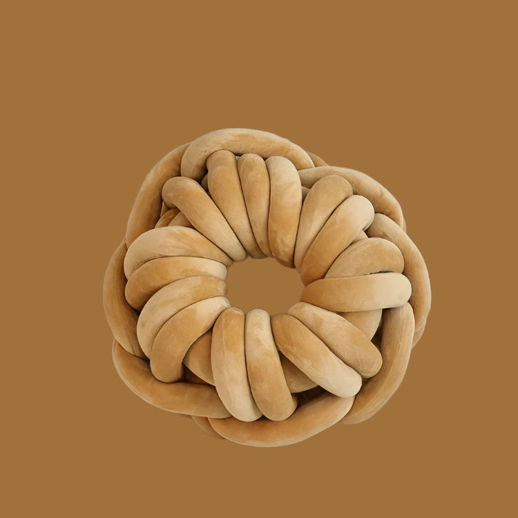 Brown knotted pillow round donut shaped weaved throw pillow
