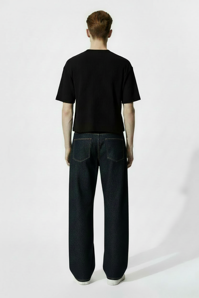male model Victor – back view of heavyweight blue denim jeans 