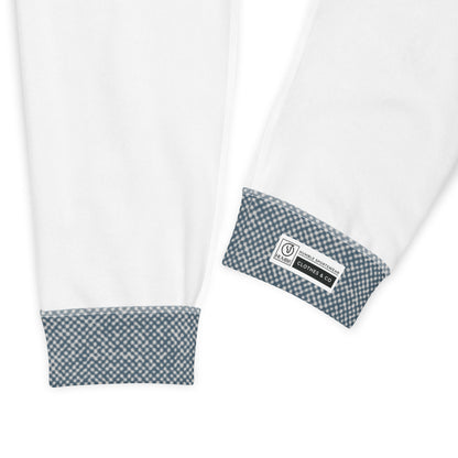 White interior of slim fit jogger pants with a blue and white patterned hem showing a logo on a white background