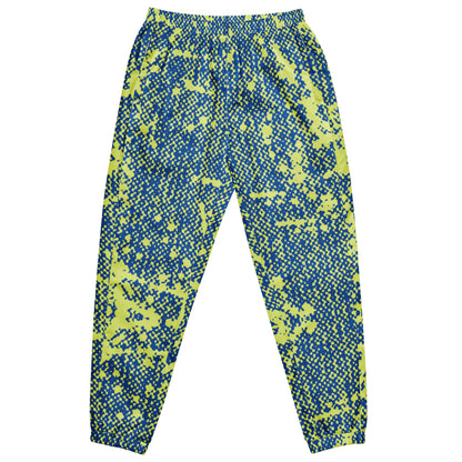 A pair of blue track pants with a geometric pattern, featuring an elastic waistband and ankle cuffs, with a mesh lining.