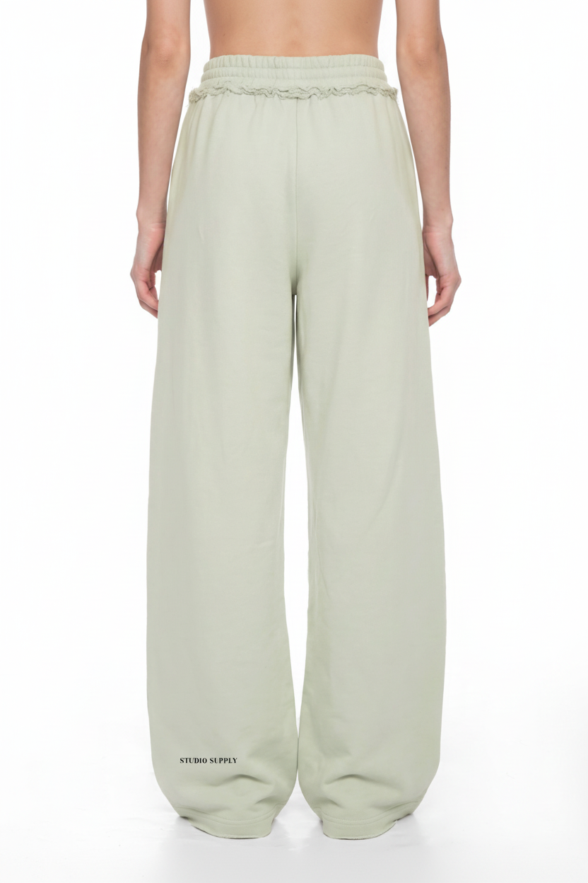back view of women's wide leg sweatpants with text 